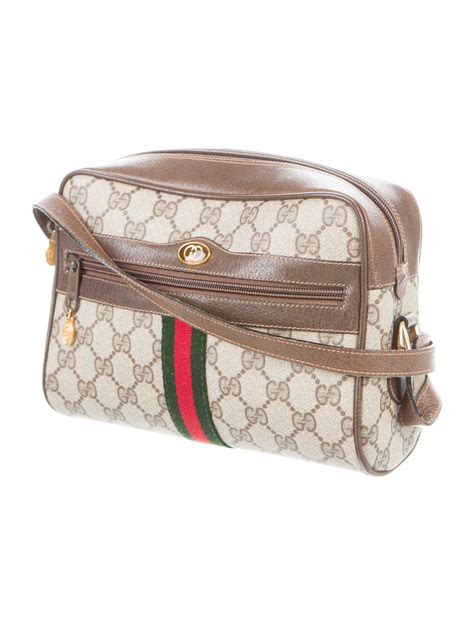 gucci vintage gg shoulder bag with push closure|old style vintage gucci bag.